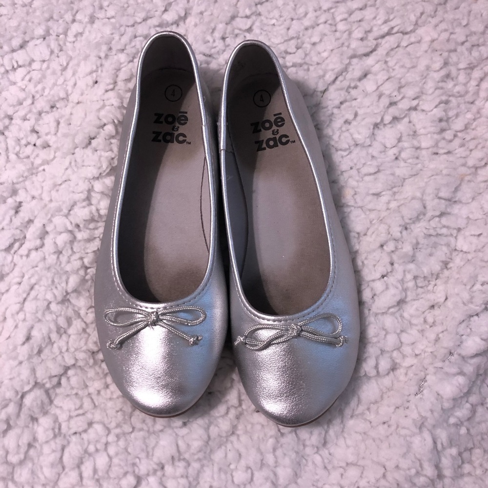 silver shoes with bow detail